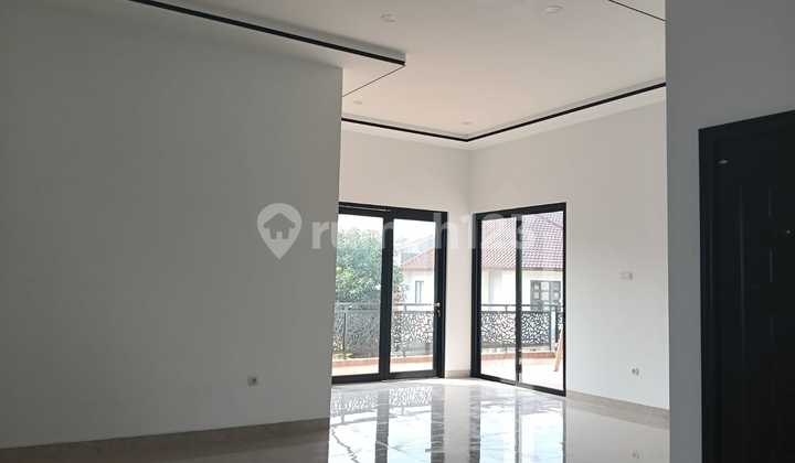 Rumah Modern Minimalis Kencana Loka Bsd 2