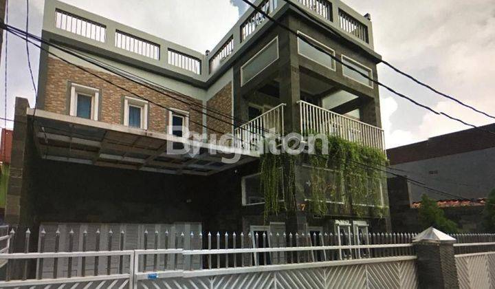 RUMAH MEWAH 2,5 LANTAI PLUS ROOFTOP DI KAYU RINGIN JAYA 1