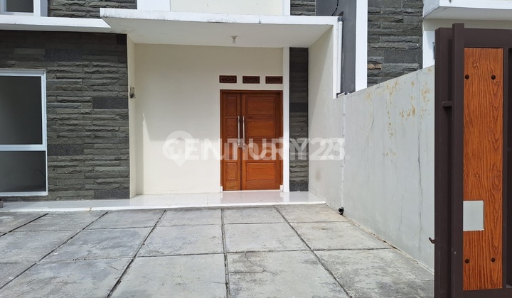 garasi/carport rumah 2 lantai siap huni
