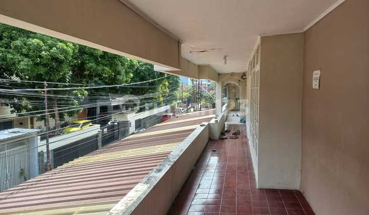 For sale: Commercial assets including a residential house, boarding rooms, and a Badminton Hall in Dago, Bandung.