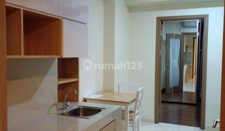 UNIT PURI ORCHARD APARTMENT DI TOWER ORANGE GROVE DENGAN PEMANDANGAN KOTA JAKARTA BARAT DI LOKASI STRATEGIS! 1