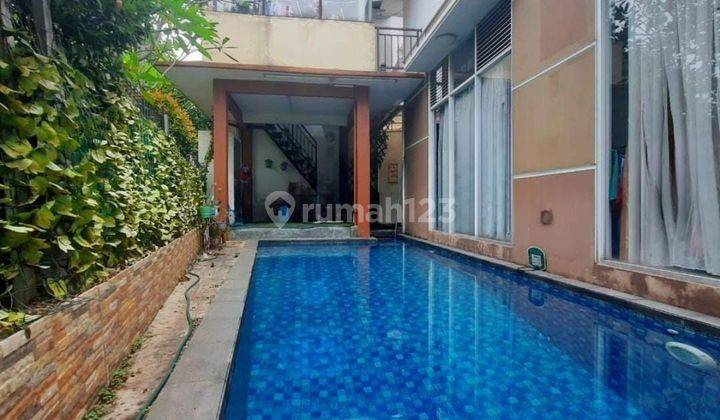 Rumah bagus 2 lt minimalis siap huni ada kolam renang di Graha Raya 1