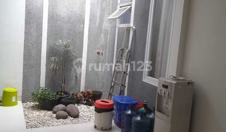 Rumah Siap Huni Sudah Renovasi Bangunan 1,5lt Di Graha Raya 2