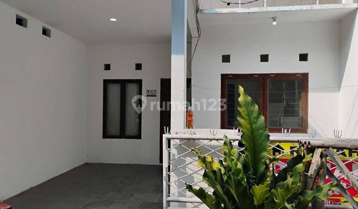 Rumah 10 Menit ke Mall Paradise Walk Serpong SHM Dibantu KPR J34135 2