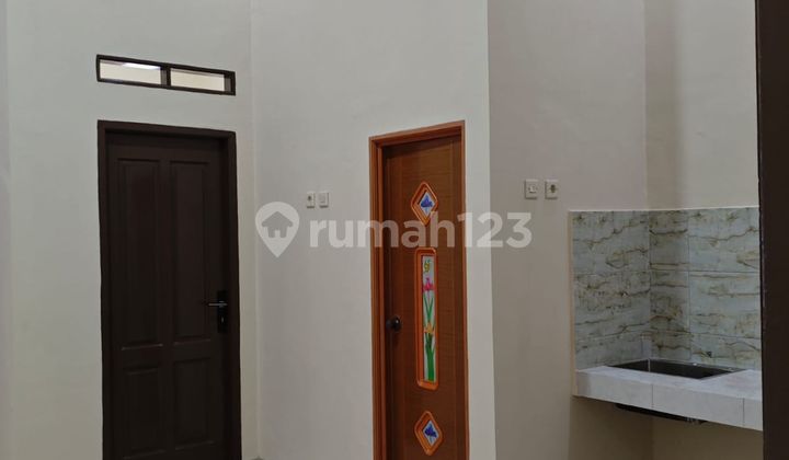 Rumah SHM 10 menit ke Plaza Taman Harapan Baru Siap Huni Dibantu KPR J32676 2