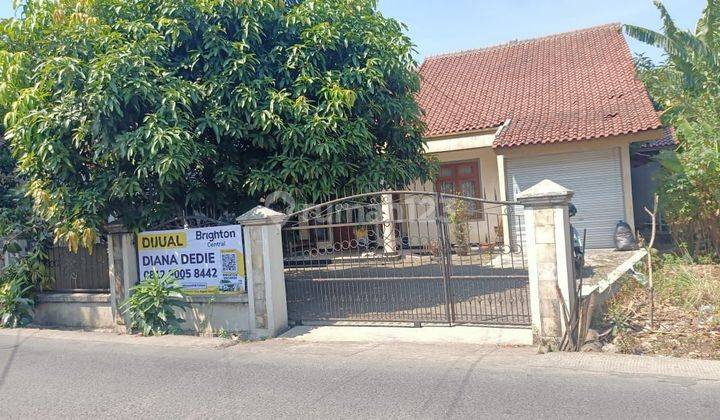 RUMAH STRATEGIS DIPINGGIR JALAN RAYA DGN HALAMAN YG LUAS 1