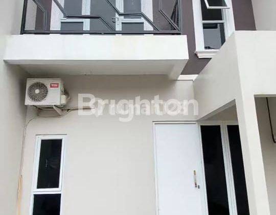 RUMAH 2 LANTAI  600JT AN DI TANAH BARU 1