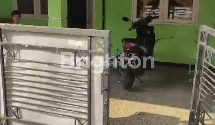 RUMAH ASRI DI PERUMAHAN PGRI KALIBARU 1