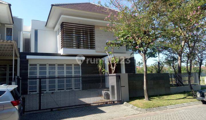 Rumah Mewah Tropical Minimalis, Baru Gress, Suasana Sangat Nyaman. Lokasi di Perumahan Elit Graha Famili Surabaya Dekat Dengan Pakuwon Mall, Pakuwon Indah, Citraland  1