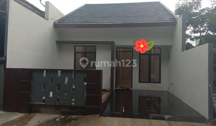 Rumah Mungil Minimalis Dalam Cluster Di Graha 1