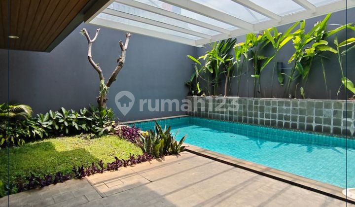 For Quick Rent - Nice and Tidy Semi-Furnished House with Swimming Pool, 4+1 Bedrooms, 3+1 Bathrooms in Kebayoran Baru, South Jakarta.