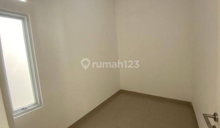 Rumah Unfurnished SHM Di Perumahan Grand Resident Bekasi 2