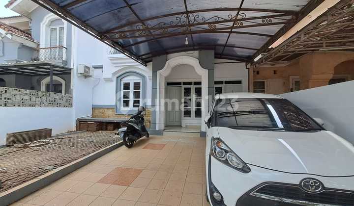 For sale, move-in ready house facing the road in Nusa Loka BSD, strategic location.