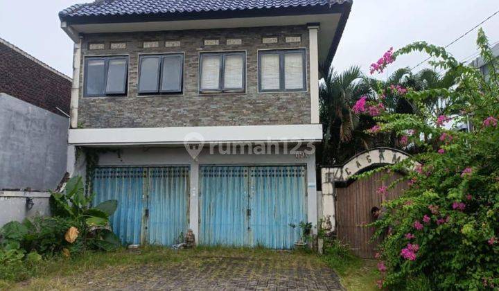 House with shop in commercial area on Jl Dewi Sri suitable for business 1