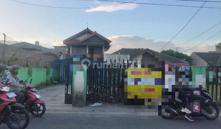 Dijual tanah + rumah di karang tengah cocok untuk bangunan komersil 1