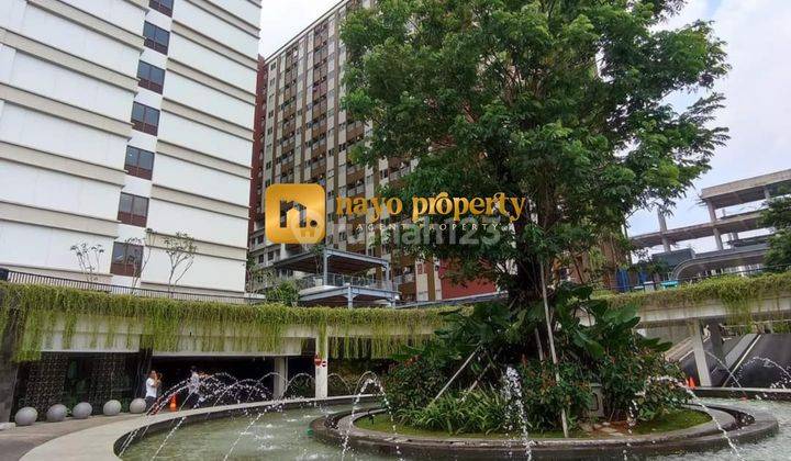 tampak depan unit studio apartemen lrt city
