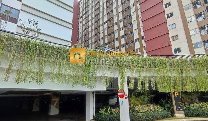 tampak depan unit studio apartemen lrt city