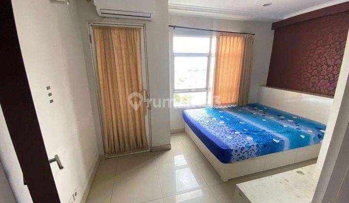 1 BR Bukan Studio Apartemen Metropolis Ada ruang tamu 1