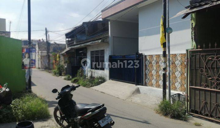 Rumah di jual cepat di jalan Teratai taman cibodas tangerang 2