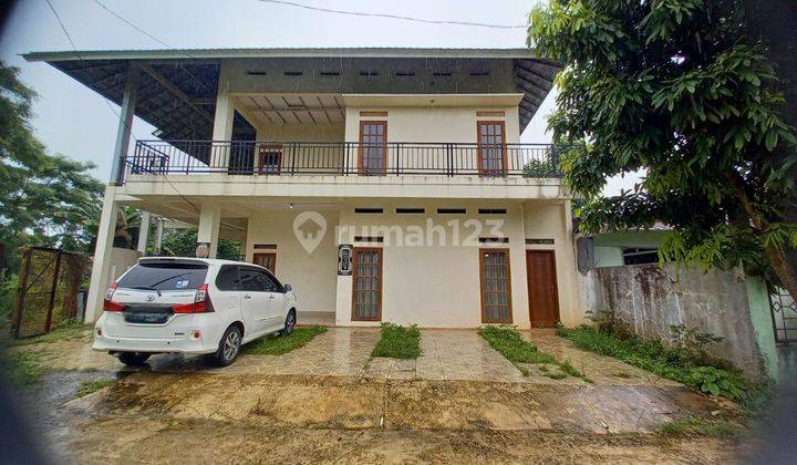 garasi/carport rumah 2 lantai di batan