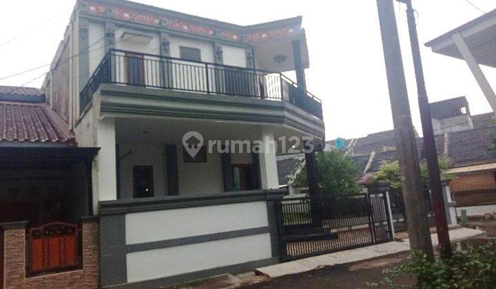 tampak depan rumah hoek 2lt di villa