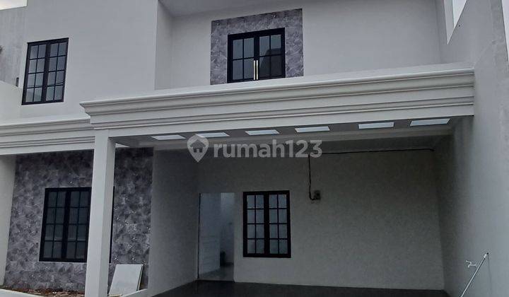 Rumah 2 lantai + roop top di 3 perbatasan kota strategis aman 1