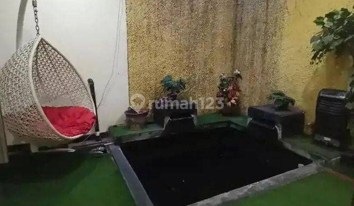 Rumah clasic pondok kelapa  jakarta timur nyaman lingkungan tenang 2