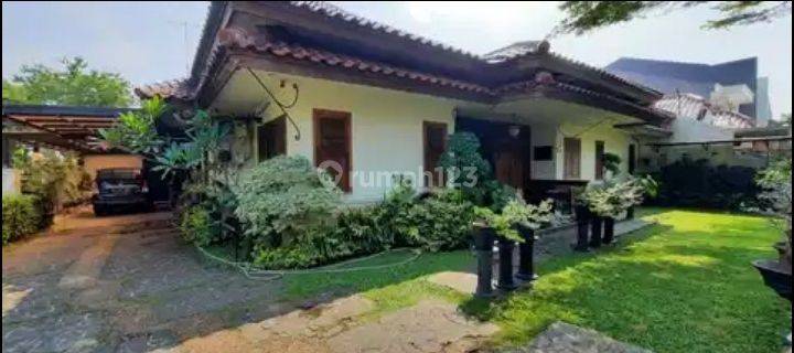 Rumah Lokasi Pinggir Jalan Raya di Pondok Kelapa  1