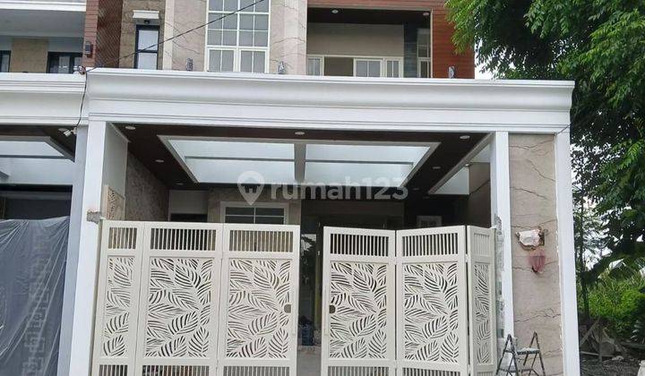 Rumah Baru row 4 mobil di Jemursari Surabaya Selatan 1