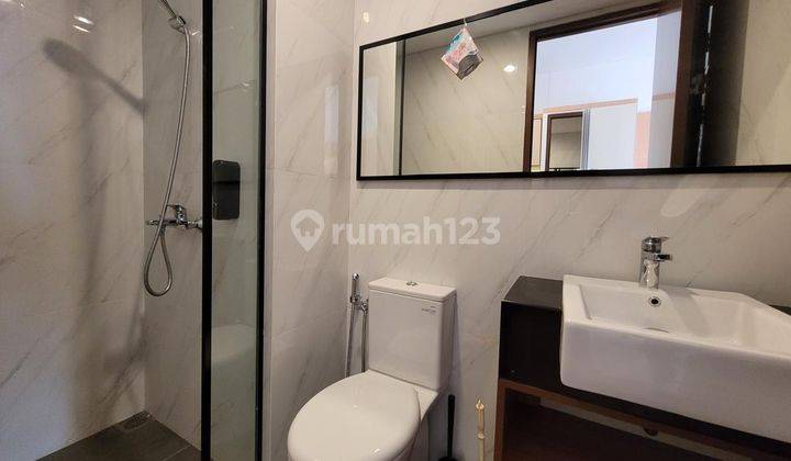 Apartement The Newton 1 1 BR Furnished Bagus 2