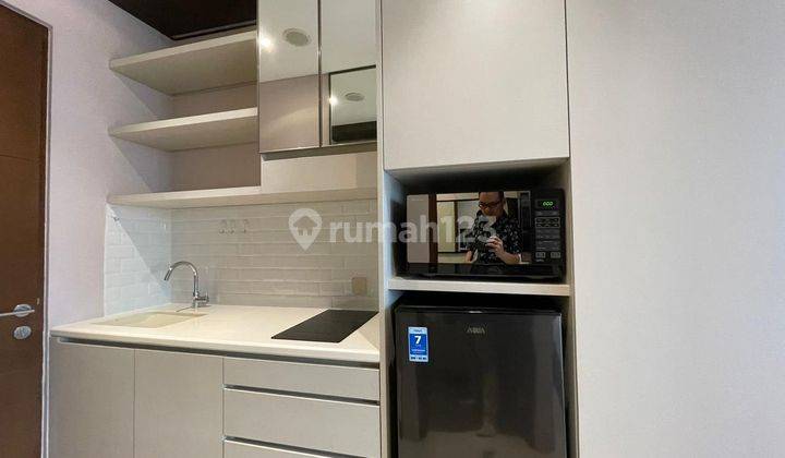 Apartement The Newton 1 1 BR Furnished Bagus 2