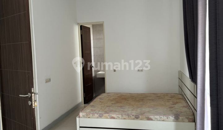 Semi-Furnished 2-Story House with SHM in South Tenggilis Mejoyo 2