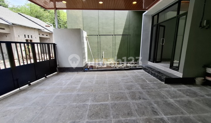 RUMAH BESAR CARPORT 2 DESAIN MINIMALIS DI KALASAN 2