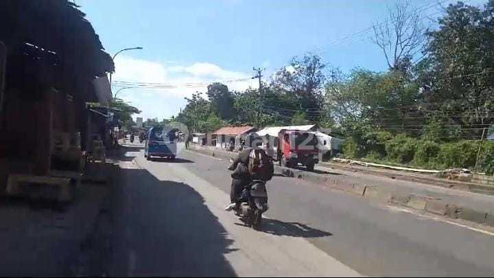 Tanah Datar pinggir jalan Cocok Untuk komersial di Jl Raya Parung