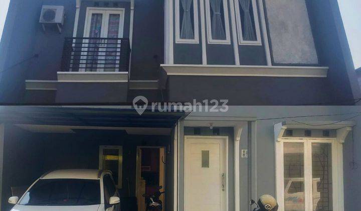 RUMAH MEWAH SIAP HUNI TERMURAH 2 MENIT KE JL RAYA RTM KELAPA DUA CIMANGGIS, DEKAT STASIUN KERETA, DEKAT TOL MARGONDA, DEKAT PUSAT BISNIS MALL  1