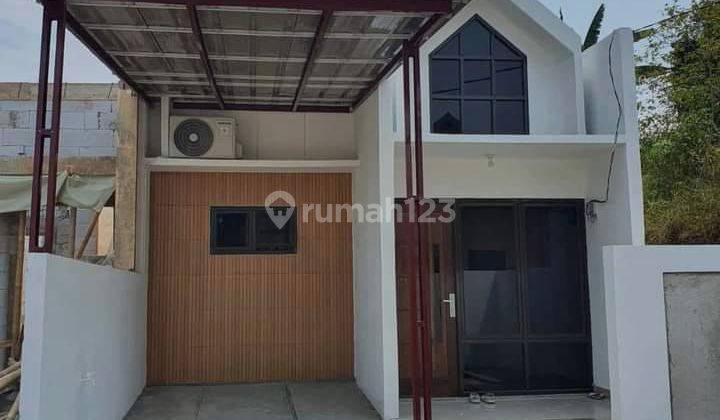 RUMAH MODERN TERMURAH DI DEPOK, DEKAT KE JALAN RAYA BESAR, 10 MENIT STASIUN KERETA, 15 MENIT TOL SAWANGAN, DEKAT PUSAT BISNIS & MALL 2