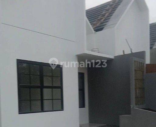 RUMAH MODERN SIAP HUNI 2 MENIT KE JALAN RAYA BESAR, 10 MENIT STASIUN DEPOK, 15 MENIT TOL MARGONDA, DEKAT PUSAT BISNIS, PUSAT KULINER DAN PUSAT MALL DI MARGONDA RAYA  2