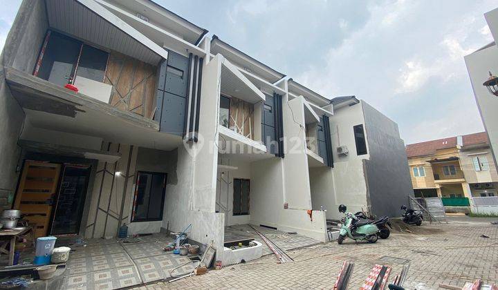 Rumah di Kutisari Indah 2 Lantai SHM Baru 1