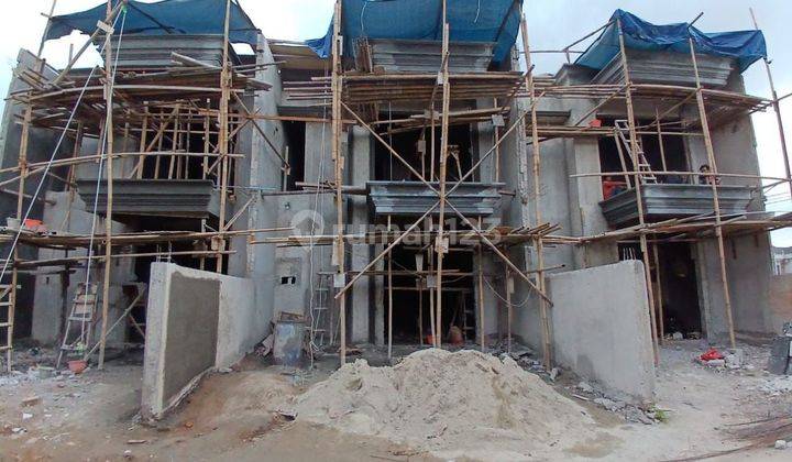 Rumah cantik 2 lantai tanah 100m2 di kalimulya depok 2