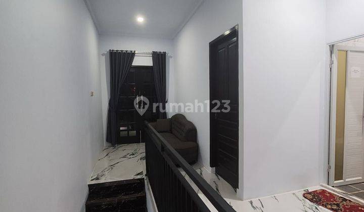 Rumah mewah 2 1/2 lantai harga murah 800 jutaan di pinggir jalan raya gas alam cimanggis 2