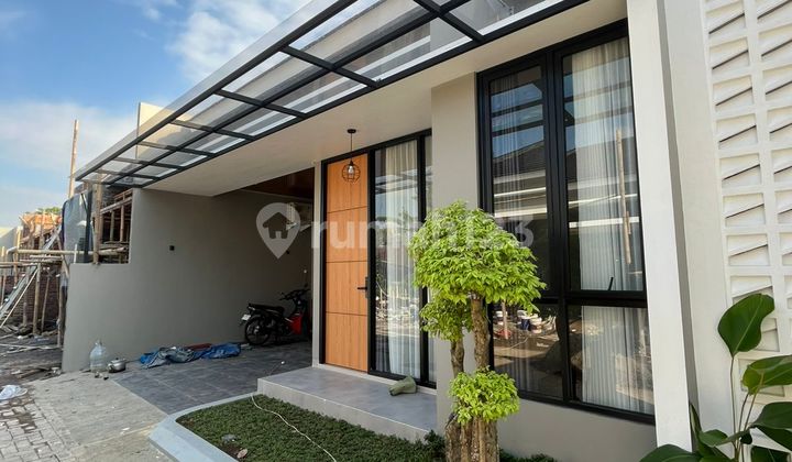 Rumah Modern dalam Cluster One Gate Lokasi Mlati, Sleman dekat Sleman CIty Hall dan Pemda Sleman 2