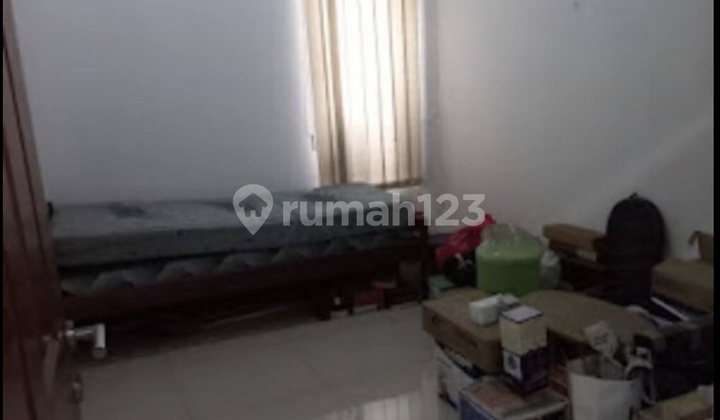 Well-Maintained House for Sale in Singgasana Pradana Housing Complex 2