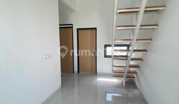 Rumah 2 Lantai + Mezzanine Dekat ke Kota Cimahi Bonus Canopy Rumah 2 Lantai + Mezzanine Dekat ke Kota Cimahi Bonus Canopy