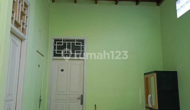 For Quick Sale: 18-door 2-story boarding house, includes pavilion, ideal for investment. 2