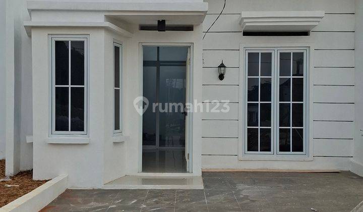 Rumah Disain Britania di Pondok Rajeg Cibinong Cukup 2 Jt All In 1