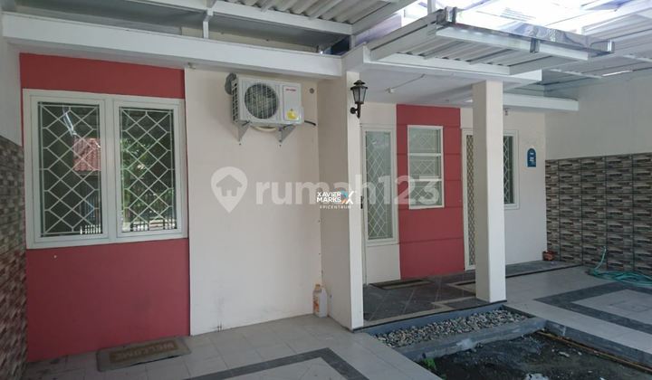 Rumah di Purimas Gununganyar di Jalan Boulevard Selangkah ke Merr