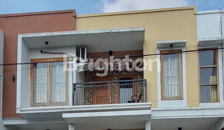 RUMAH DI PERUMAHAN GUNUNGSARI INDAH SURABAYA 1