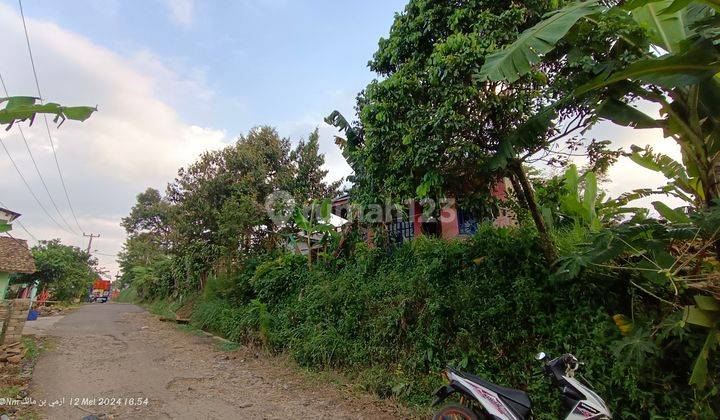 Tanah berikut rumah samping jalan besar view gunung 1