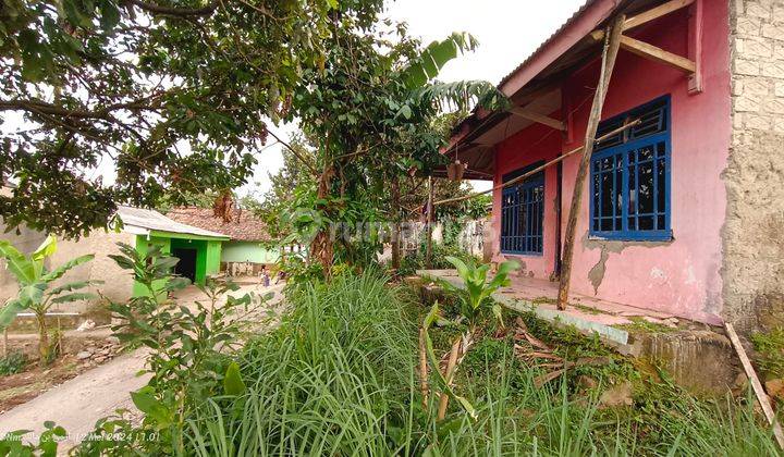 Tanah berikut rumah samping jalan besar view gunung 2