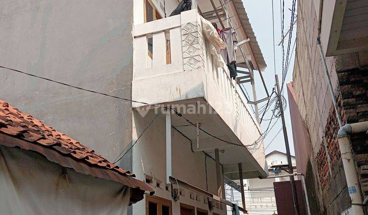 Rumah kontrakan 4 pintu 2 lantai,i Jalan kampung dua SHM 1